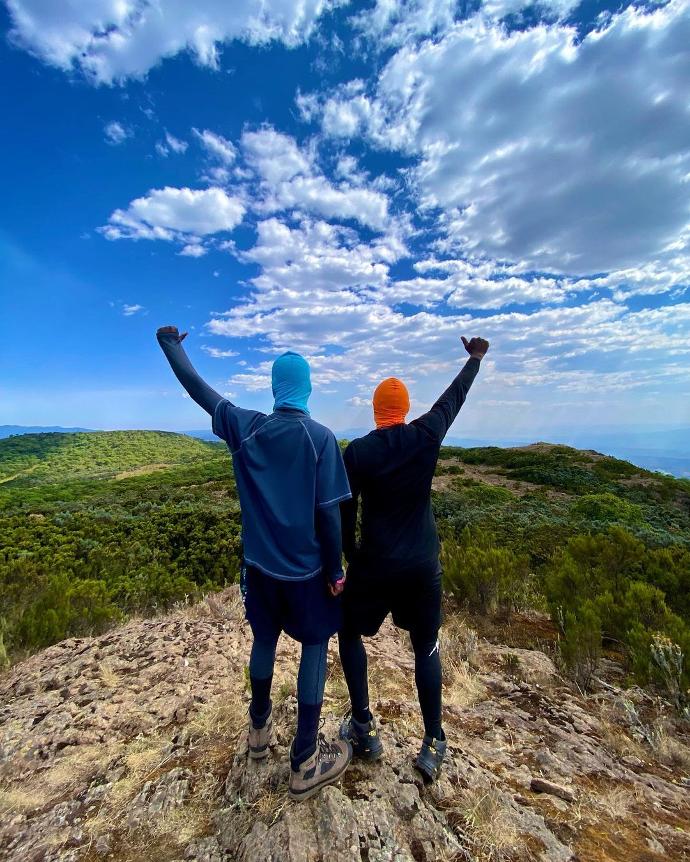 Hikers at Kipipiri Wearing our Orange and Light Blue Balaclavas