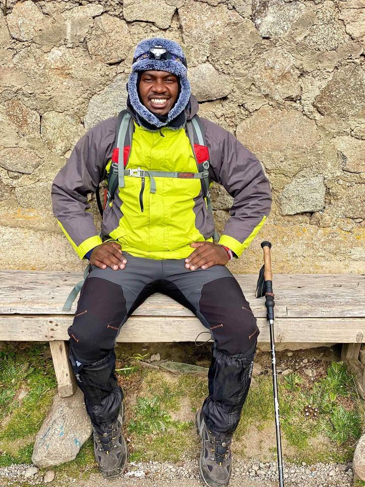 Hiker showing off Mount Kenya Summit Gear