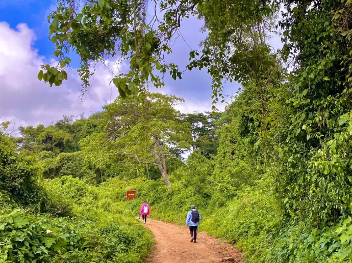 Hikers descending the Kilimambogo hiking trail at Ol Donyo Sabuk National Park