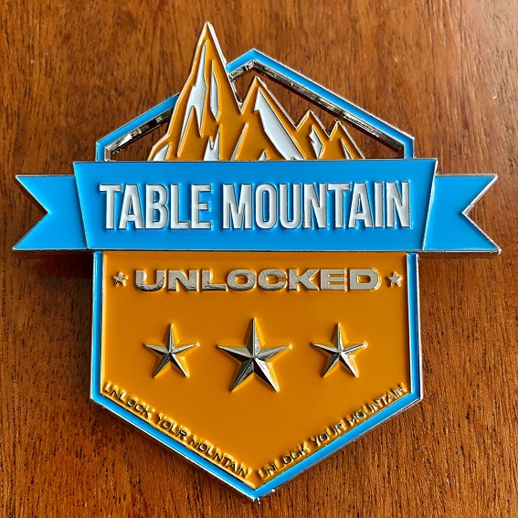 Unlock Your Mountain Souvenir Badge